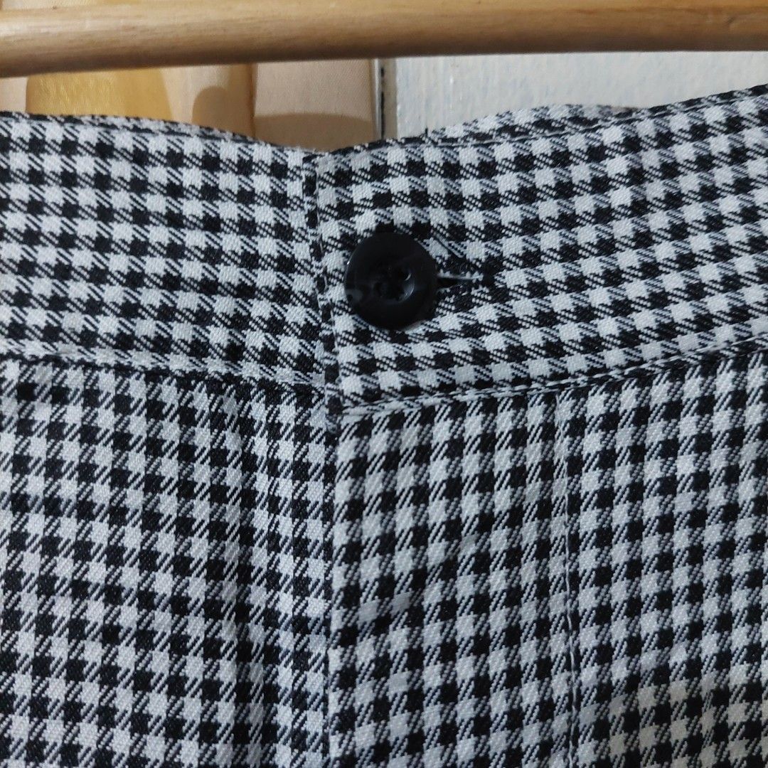 Black and white houndstooth pattern trousers (Category: Other Bottoms) located in Governor Generoso. Submitted by cma_rarefitph (Listing ID 1469999508, Image 3). Description: Waist-30 inches Length-39 inches - Classic black and white houndstooth pattern - Flattering high-waist cut with a dark single button closure - Timeless straight-leg fit - Functional back pockets included - Versatile retro style, perfect for pairing with plain tops or sweater
