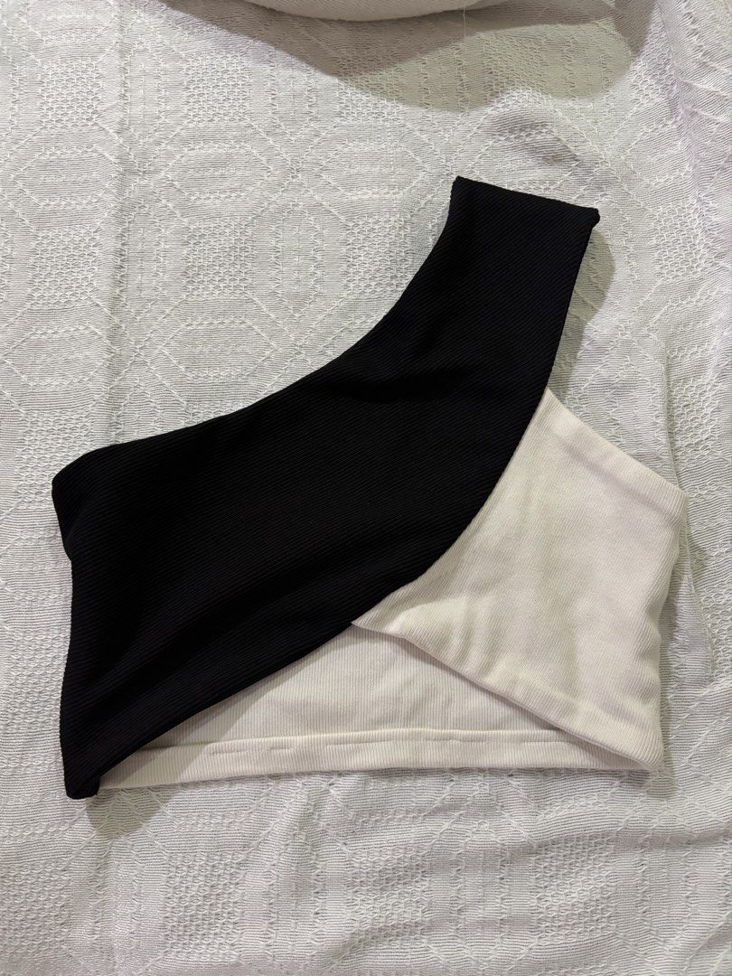 Black and white one shoulder crop top (Category: Sleeveless) located in Muntinlupa City. Submitted by sukimum (Listing ID 1469989020, Image 1). Description: Unique reworked assymetrical top. Can be dressed down or up.