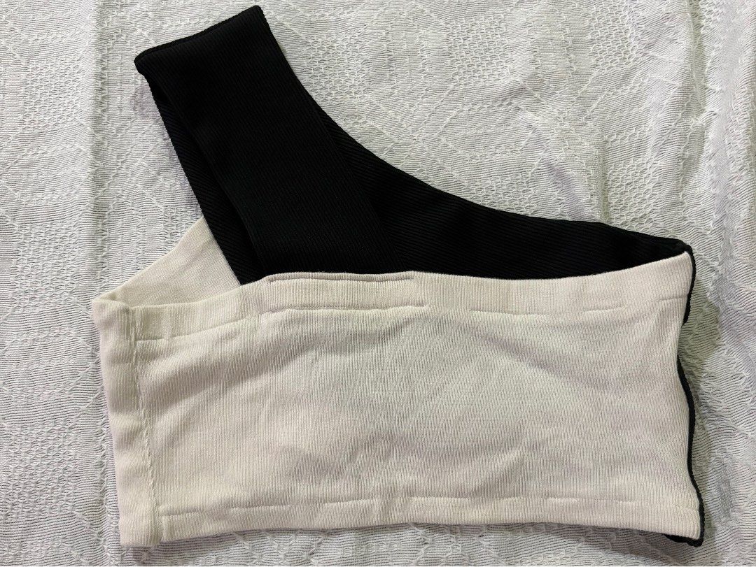 Black and white one shoulder crop top (Category: Sleeveless) located in Muntinlupa City. Submitted by sukimum (Listing ID 1469989020, Image 2). Description: Unique reworked assymetrical top. Can be dressed down or up.