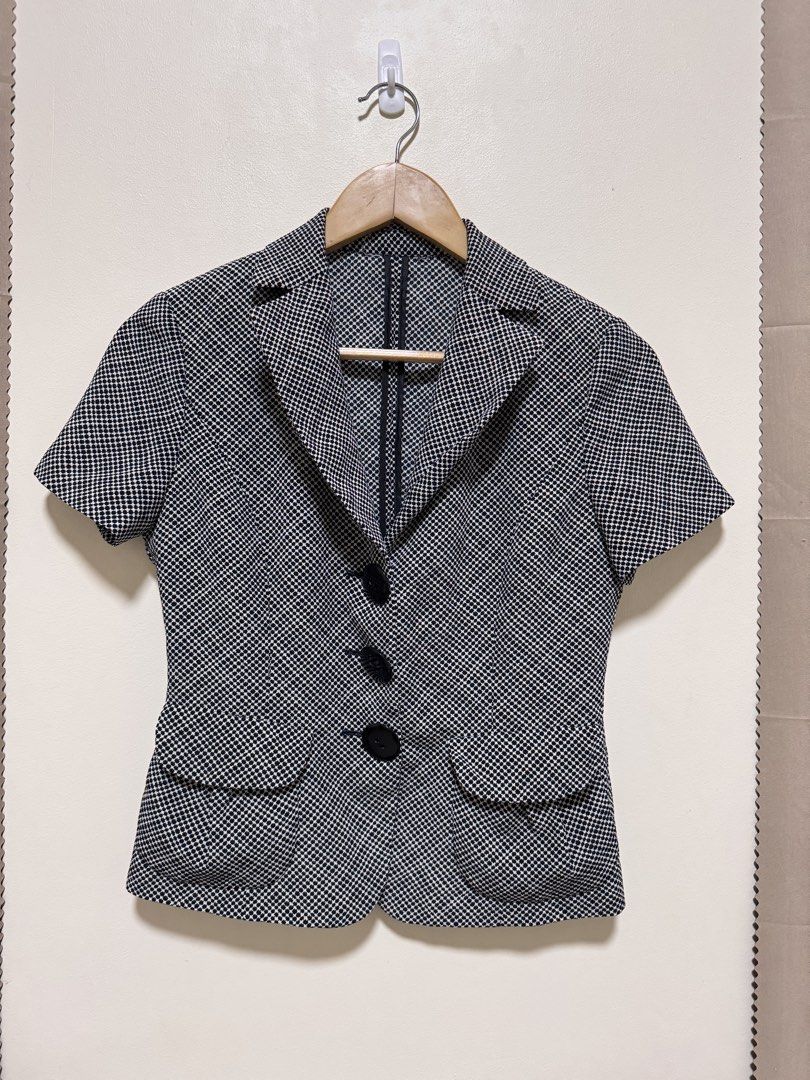 Black and White Patterned Short Sleeve Blazer (Category: Blouses) located in Manila. Submitted by seayouncey (Listing ID 1470055846, Image 1). Description: - Style: Black and white houndstooth jacket - Sleeves: Short sleeves with tailored fit - Details: Lapel collar, 3 black front buttons, 2 flap pockets, and back seam details - Versatility: Perfect for office wear or smart casual outfits - Condition: Excellent / Ready to wear.