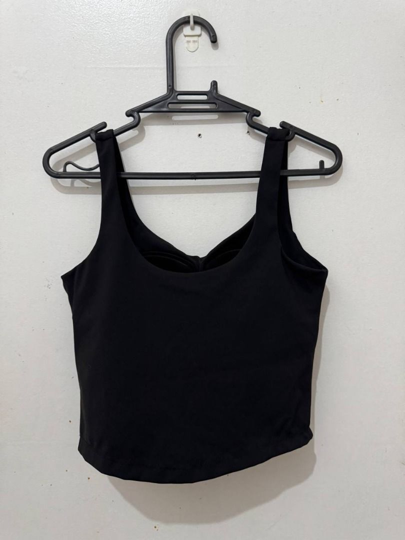 Black Cropped Tank Top with Built-in Padding (Category: Sleeveless) located in Santa Rosa. Submitted by sherikasstuff (Listing ID 1469955969, Image 1). Description: - Color: Solid black - Design: Cropped length, U-neckline, and wide straps - Features: Built-in chest padding for extra convenience - Material: Soft and stretchy fabric for all-day comfort - Styling: Versatile basic piece, great for workouts or casual outfits - Size: S but can fit XS-