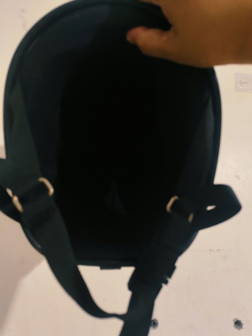 Black Half Helmet with Silver Trim and Chin Strap (Category: Caps & Hats) located in Bulacan. Submitted by babz30261 (Listing ID 1470088694, Image 2). Description: - Color: Glossy black with metallic silver trim - Hardware: Brass-tone snap buttons and front strap attachment - Chin Strap: Adjustable black strap with quick-release buckle - Interior: Comfortable dark padding - Safety: Certified safety sticker included - Condition: Normal signs of us