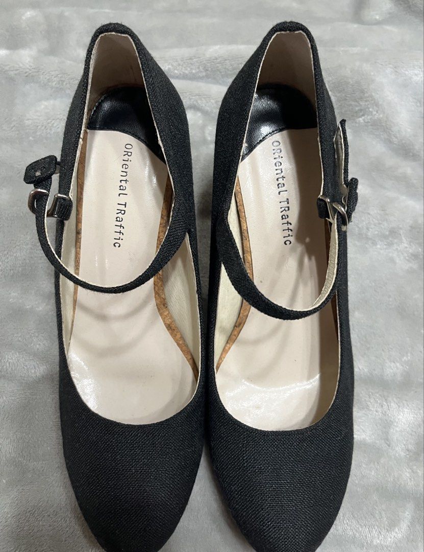 Black heels (Category: Heels) located in Bacoor. Submitted by ayit. (Listing ID 1470047917, Image 1). Description: Orig personal japan once Used lng size 7-7.5 fit halos new Sf inc - Brand: Oriental Traffic - Color: Classic Black - Size: EU 41 (US 7 / UK 5) - Design: Closed-toe Mary Jane style with adjustable ankle strap - Unique Details: Trendy cork-textured heel and platform trim - Condition: Good pre-owned condition, ready to wear.