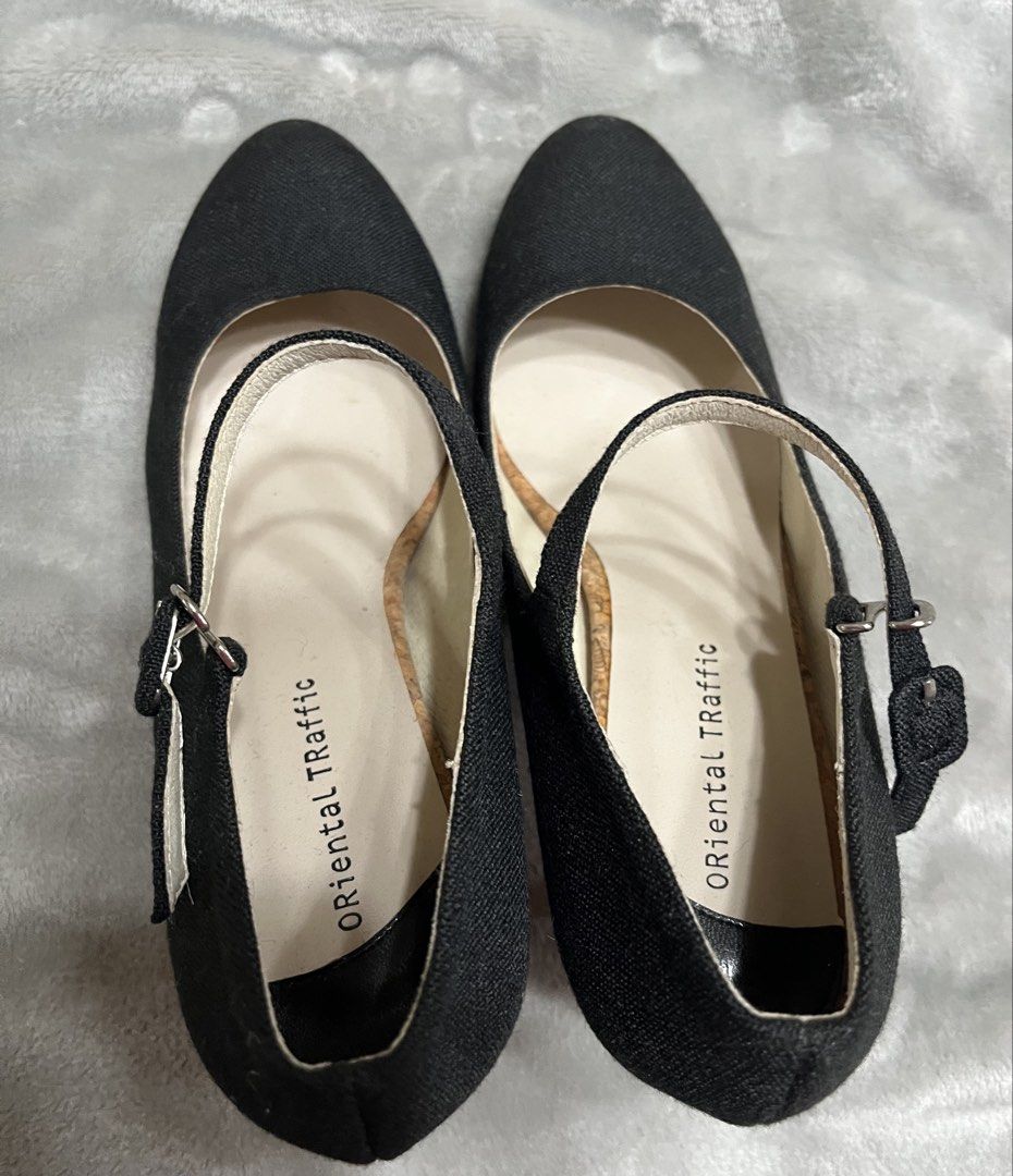 Black heels (Category: Heels) located in Bacoor. Submitted by ayit. (Listing ID 1470047917, Image 2). Description: Orig personal japan once Used lng size 7-7.5 fit halos new Sf inc - Brand: Oriental Traffic - Color: Classic Black - Size: EU 41 (US 7 / UK 5) - Design: Closed-toe Mary Jane style with adjustable ankle strap - Unique Details: Trendy cork-textured heel and platform trim - Condition: Good pre-owned condition, ready to wear.