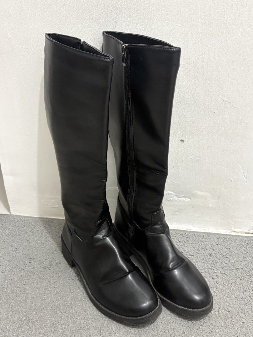Black Long Boots Knee High With Zips - SHEIN (Category: Boots) located in Pasig City. Submitted by _jinwifeu_ (Listing ID 1470051044, Image 2). Description: - Comfort: Low heel, round toe perfect for 20,000 steps ++ - Condition: Worn a few times with minimal crease marks near the ankles - Easy to pull on and style with any outfit.