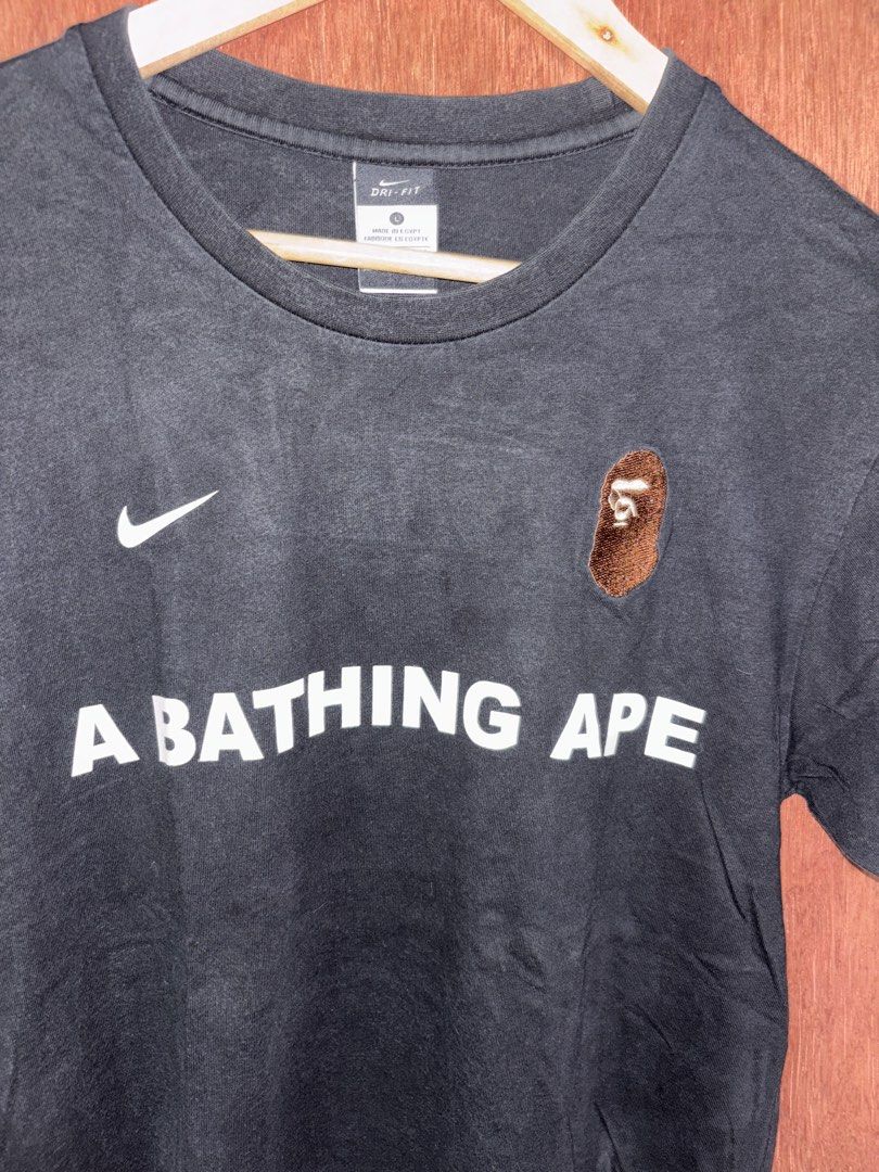 Black Nike x A Bathing Ape T-shirt (Category: Tshirts & Polo Shirts ) located in Cabuyao City. Submitted by giothr1ft (Listing ID 1470064188, Image 3). Description: -Width: 20 -Length: 27 -Condition: 5/10 📌Buyers will shoulder the shipping fee.