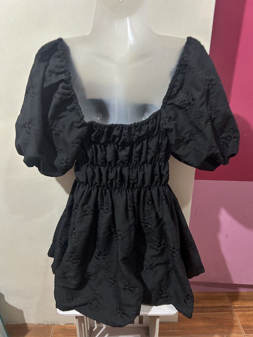 Black Puff Sleeve Square Neck Mini Dress (Category: Dresses) located in Marilao. Submitted by bamito (Listing ID 1470127088, Image 3). Description: - Color & Style: Black mini dress with all-over embroidered floral patterns - Neckline & Sleeves: Square neckline with trendy, voluminous short puff sleeves - Fit & Comfort: Back elastic smocking for a flexible and comfortable stretch - Silhouette: Cute short flared skirt portion .