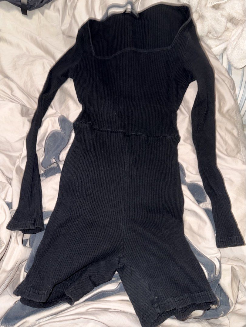 Black Ribbed Square Neck Long Sleeve Romper (Category: Rompers) located in Paranaque City. Submitted by paulinsangan (Listing ID 1470020607, Image 1). Description: - Color: Black - Material: Stretchy ribbed knit fabric for a super comfortable fit - Design: Square neckline, long sleeves, and attached shorts - Style: Easy throw-on-and-go piece - Best for: Casual days out or cozy lounging at home.