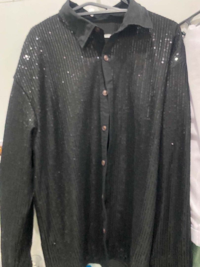 Black Sequin Long Sleeve Button Down Shirt for Men Retro Disco Theme (Category: Longsleeves) located in Cabanatuan. Submitted by gxxxgb (Listing ID 1470049703, Image 3). Description: - Color: Black - Design: Covered in shimmering vertical rows of sequins - Details: Classic pointed collar and dark front buttons - Fit: Relaxed long sleeves - Occasion: Perfect for parties, night outs, clubs, or stage performances - Highlight: Catches the light amazi