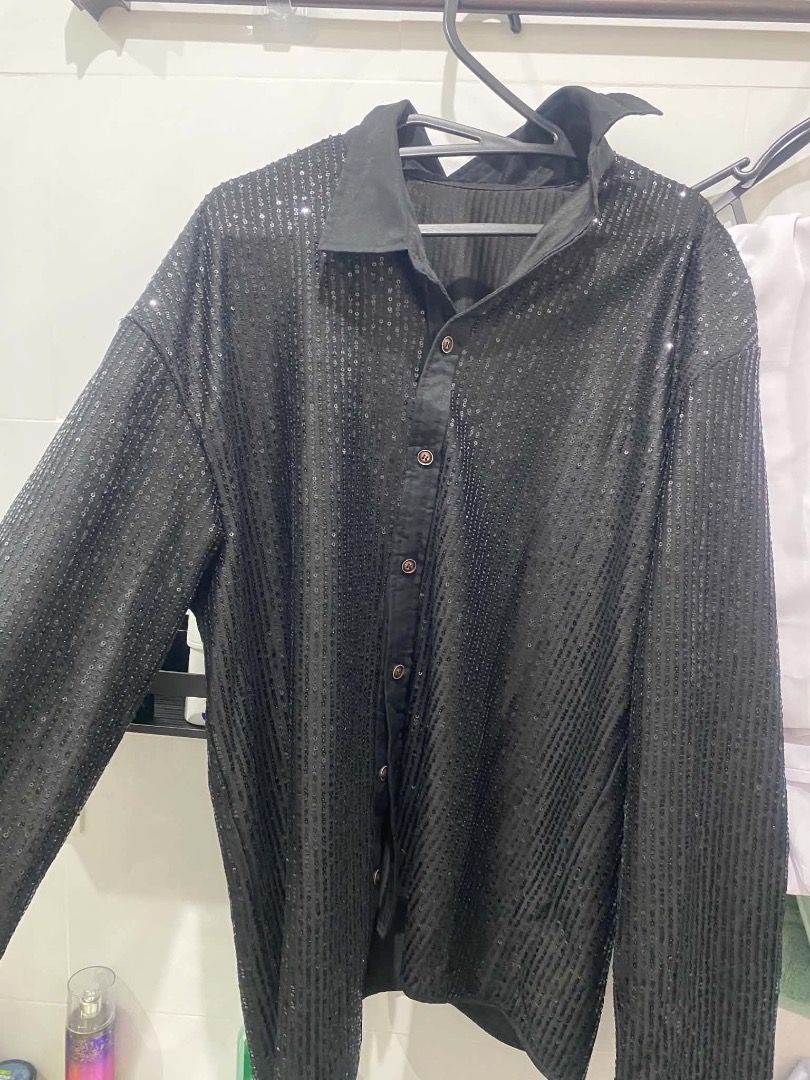 Black Sequin Long Sleeve Button Down Shirt for Men Retro Disco Theme (Category: Longsleeves) located in Cabanatuan. Submitted by gxxxgb (Listing ID 1470049703, Image 1). Description: - Color: Black - Design: Covered in shimmering vertical rows of sequins - Details: Classic pointed collar and dark front buttons - Fit: Relaxed long sleeves - Occasion: Perfect for parties, night outs, clubs, or stage performances - Highlight: Catches the light amazi