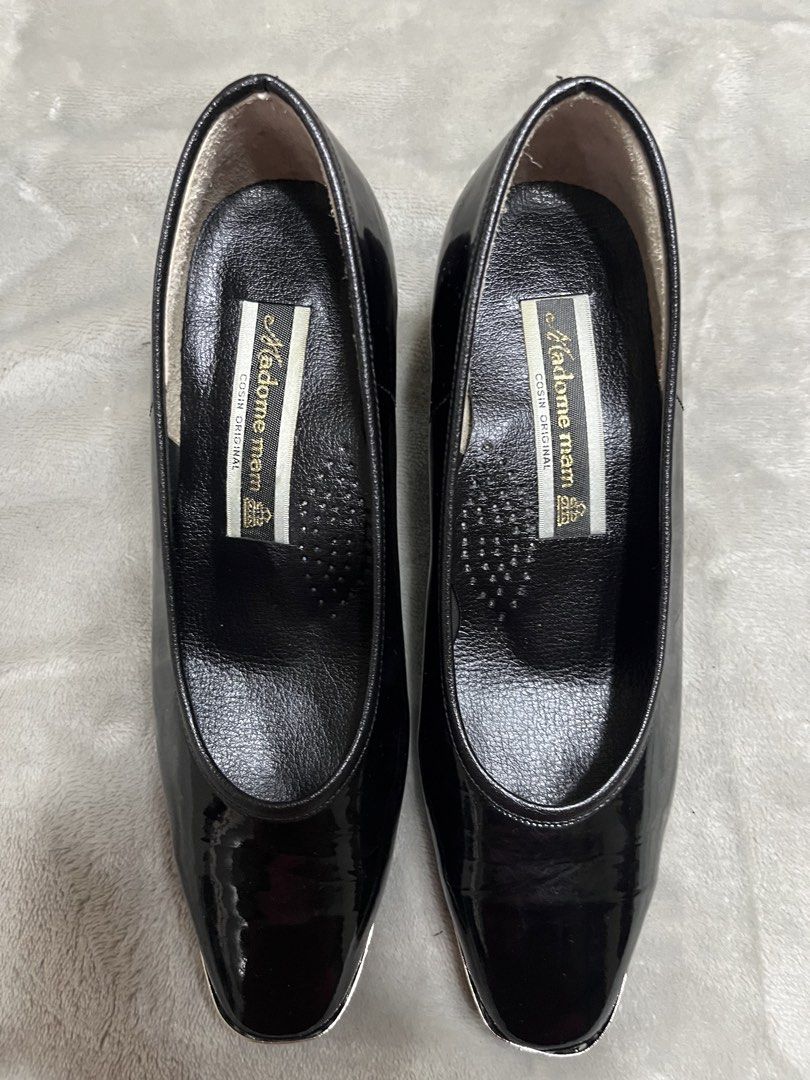 Black shoes heels (Category: Heels) located in Bacoor. Submitted by ayit. (Listing ID 1470049809, Image 1). Description: Orig personal japan Size 6 sf inc 22cm 8.5 inches - Brand: Madame Mam (Cosin Original, Japan Brand) - Color: Glossy Black Patent - Size: EU 37 / UK 4 / US 6 - Heel Type: Stable chunky heel for all-day comfort - Design Features: Classic closed-toe pump style with chic silver metal accents on the toe and heel base - Condition: We