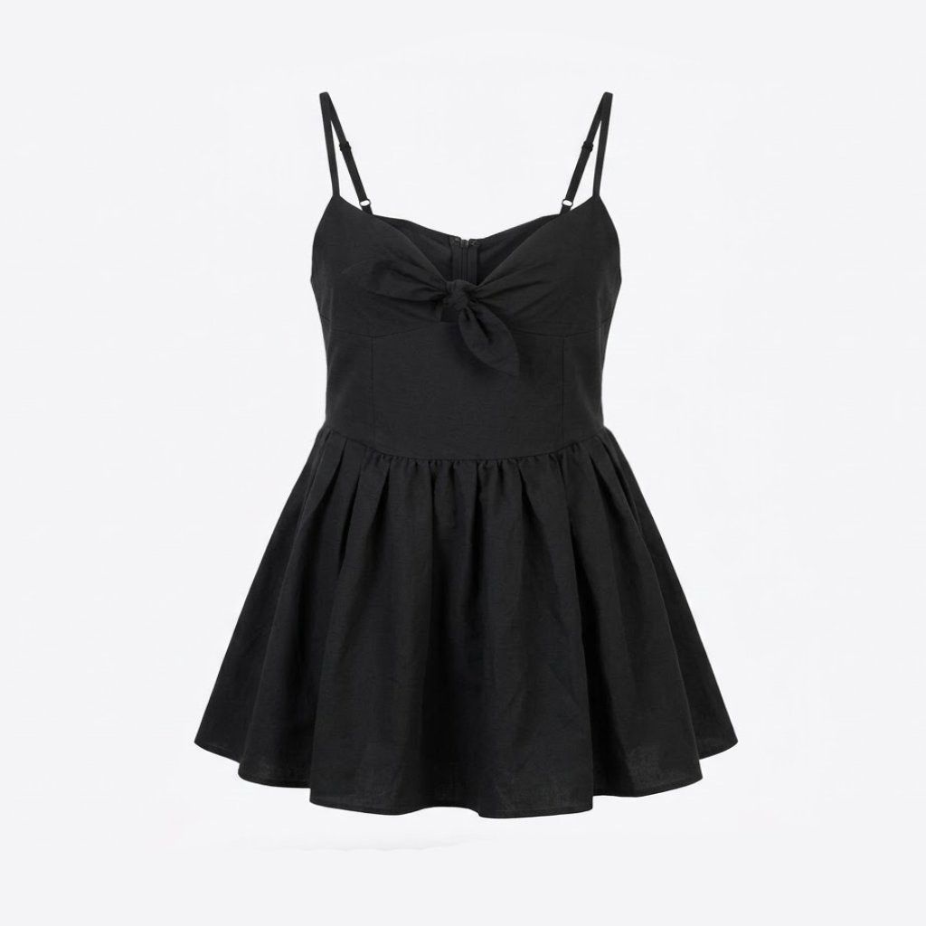 Black sleeveless flared mini dress with front tie (Category: Dresses) located in General Trias. Submitted by dearsunnyshine (Listing ID 1469996379, Image 1). Description: - Color: Solid black - Style: Sleeveless mini dress with a fitted bodice and flared pleated skirt - Neckline: Sweetheart neckline with cute center knot tie detail - Straps: Adjustable thin shoulder straps for a custom fit - Versatility: Great basic piece for warm weather, dates,