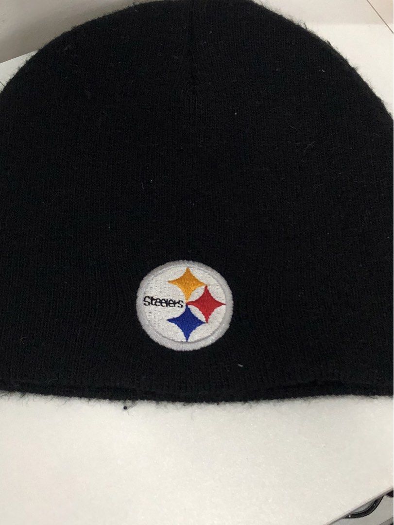 Black Steelers NFL Beanie (Category: Caps & Hats) located in Manila. Submitted by ejaay_2012 (Listing ID 1470103819, Image 1). Description: - Official NFL Team Apparel by Reebok - Color: Classic black with embroidered Steelers logo patch - Material: Warm, comfortable knit fabric - Condition: Interior branding and care tags intact - Ideal for game days, showing team pride, or chilly weather.