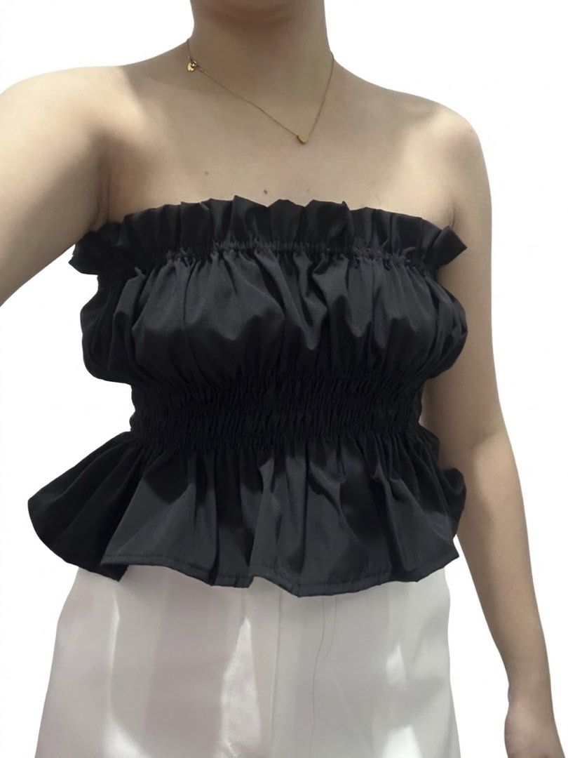 Black strapless tube top with ruffled hem (Category: Sleeveless) located in Santa Rosa. Submitted by vastmountain.c924cd (Listing ID 1470127963, Image 1). Description: Black tube top for xs to small body frame Available in color white as well.