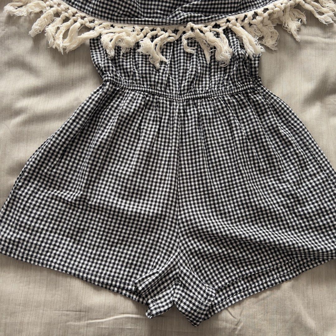 Black White Gingham Off Shoulder Tassel Romper (Category: Rompers) located in Pasig City. Submitted by jenscloset86 (Listing ID 1470002971, Image 2). Description: Size: Free Size • No damage, no flaws Measurement : Waist: 11” - 17” when stretched Length: 24”.