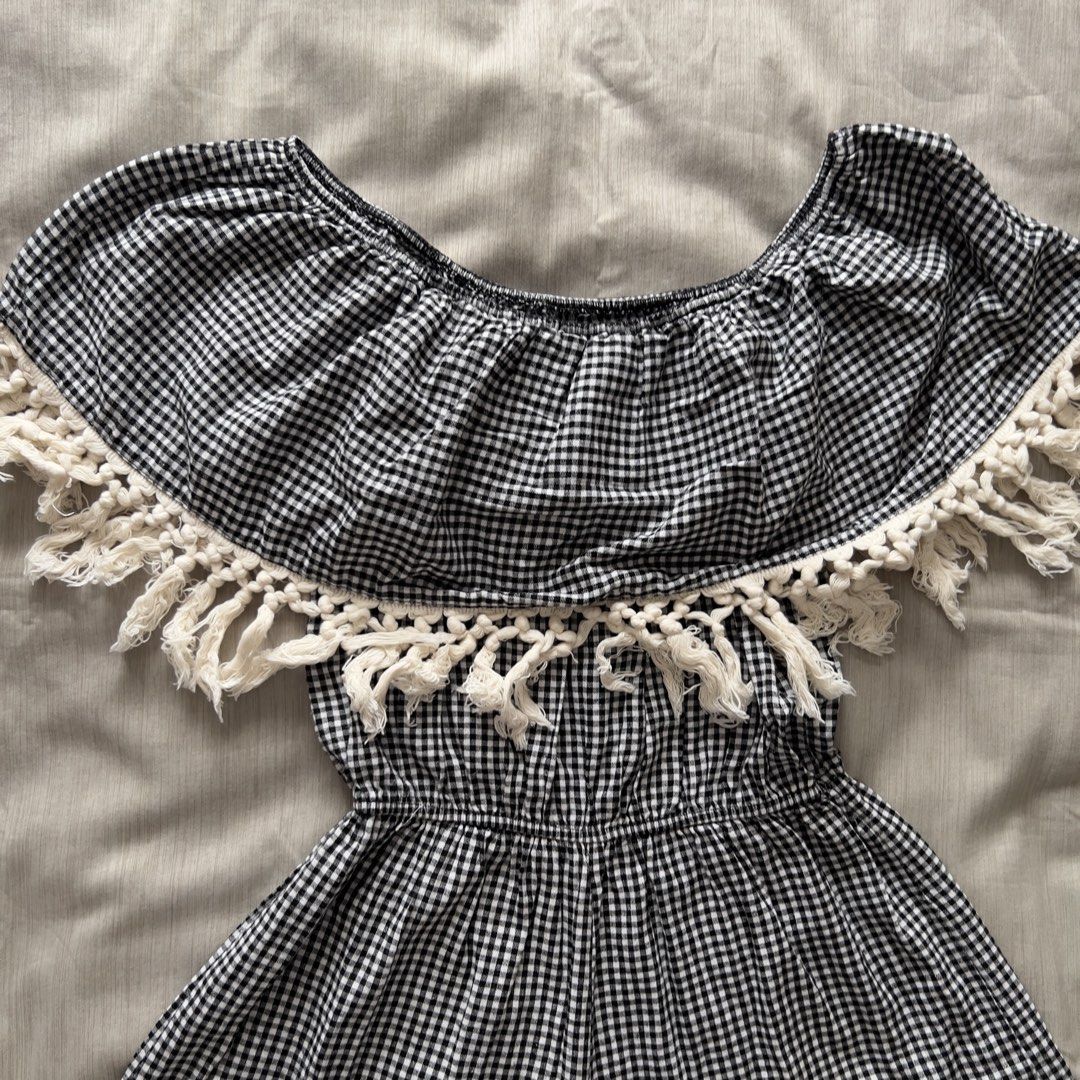 Black White Gingham Off Shoulder Tassel Romper (Category: Rompers) located in Pasig City. Submitted by jenscloset86 (Listing ID 1470002971, Image 3). Description: Size: Free Size • No damage, no flaws Measurement : Waist: 11” - 17” when stretched Length: 24”.