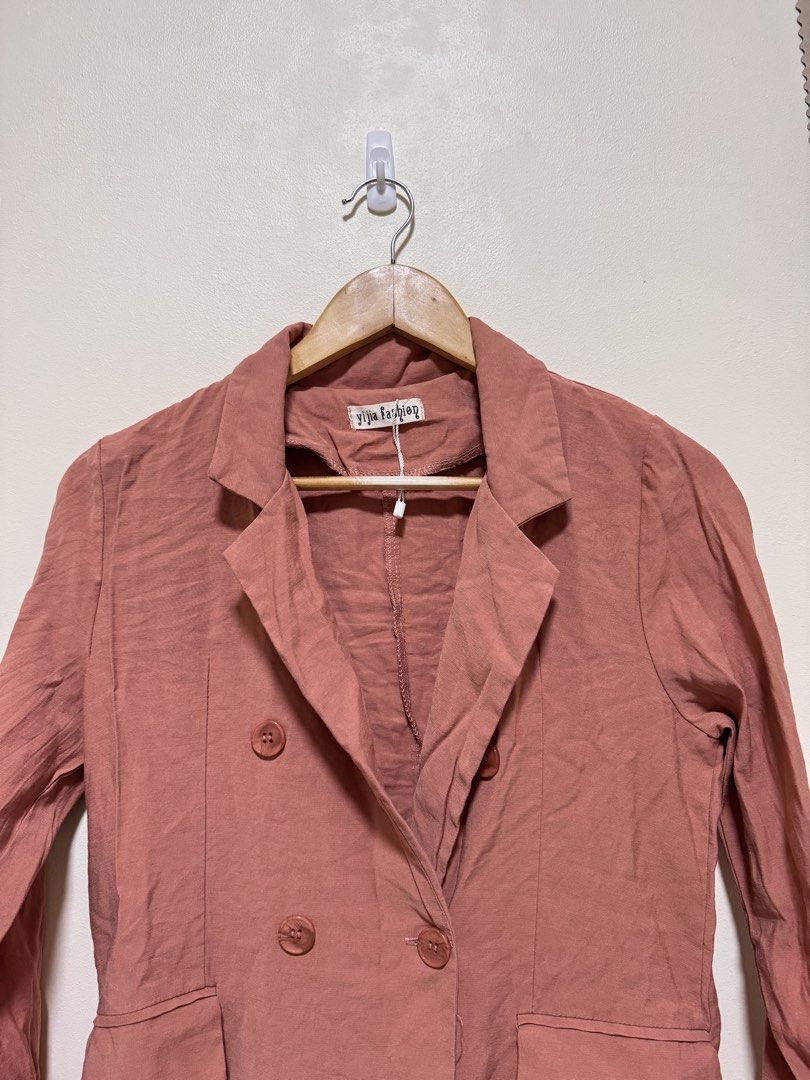 Blazer (Category: Coats, Jackets and Outerwear) located in Manila. Submitted by seayouncey (Listing ID 1470046189, Image 3). Description: Size: Length 26 inches, shoulder back 14 inches Makapal na Linen yong tela - Brand: Yijia Fashion - Color: Dusty pink - Style: Double-breasted with matching buttons and lapel collar - Features: Two front flap pockets, structured shoulders, back vent - Fabric: Lightweight and great for layering - Versatile: Perf