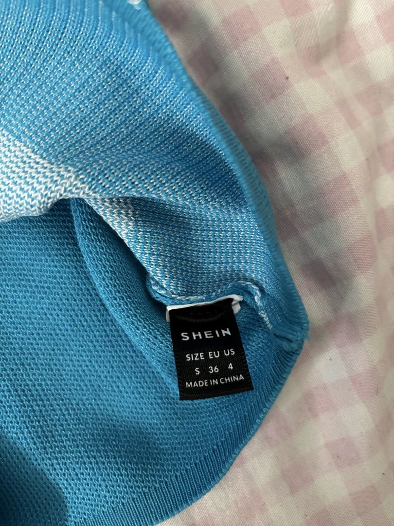 blue and white halter knitted top (Category: Sleeveless) located in Manila. Submitted by iyahpreloved_ (Listing ID 1469974080, Image 3). Description: size S!.