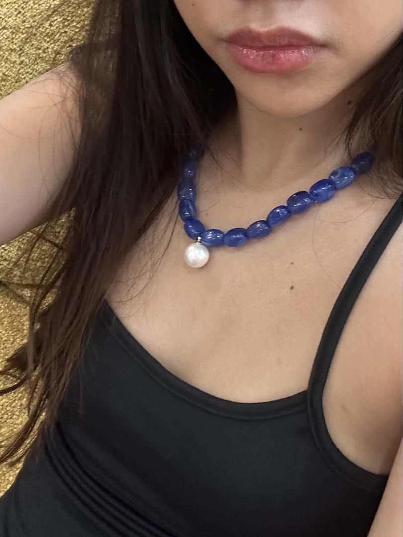 Blue beaded necklace with white pearl pendant (Category: Necklaces) located in Manila. Submitted by saudadeee (Listing ID 1470102176, Image 2). Description: - Bold blue beaded short necklace - Chunky stones that catch the light nicely - Collarbone length, perfect as a statement piece - Elevates plain black tops and casual outfits instantly.