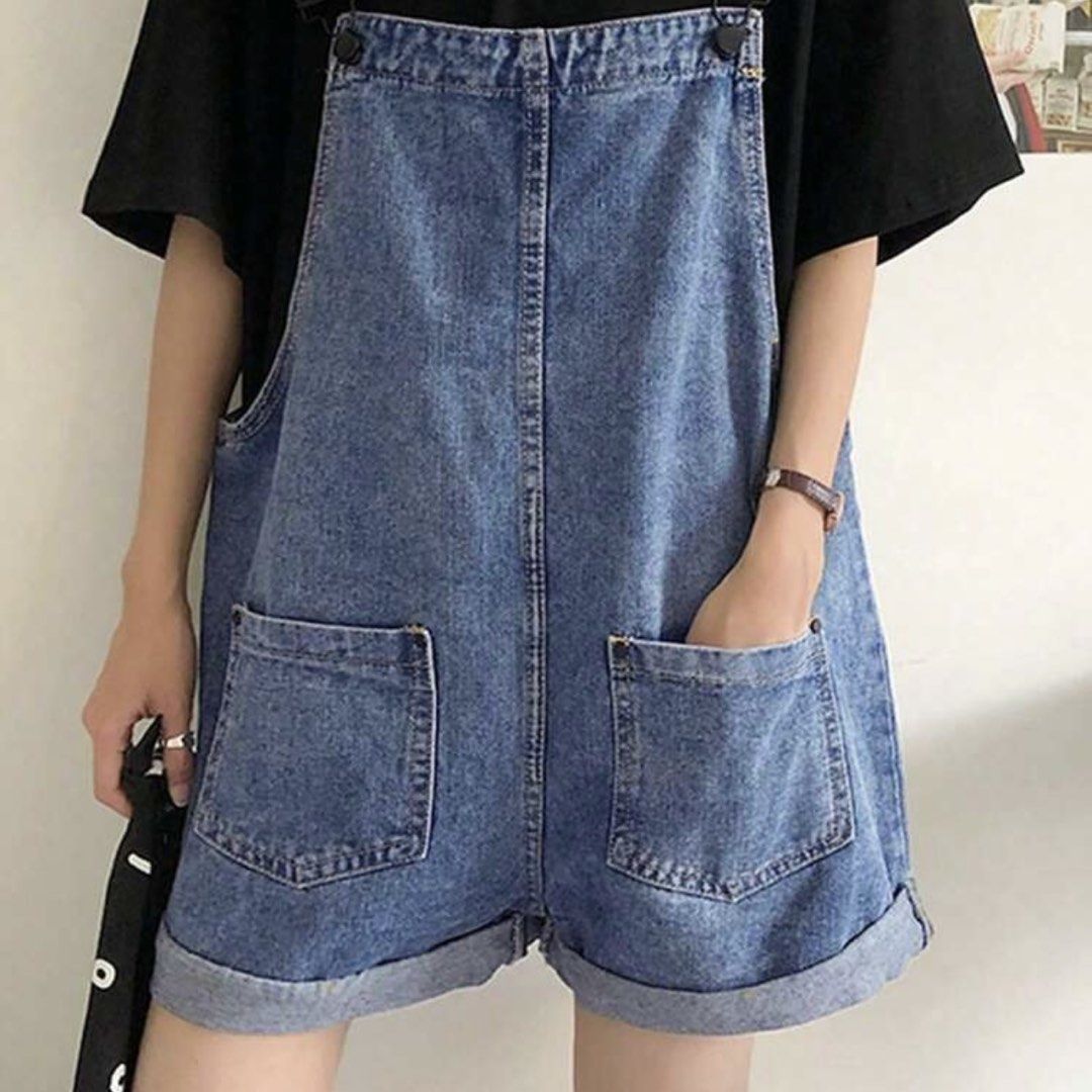 Blue denim overall shorts with front pockets (Category: Jumpsuits) located in General Trias. Submitted by dearsunnyshine (Listing ID 1470005964, Image 2). Description: - Style: Casual blue denim overall shorts - Fit: Relaxed, loose fit - Features: Adjustable shoulder straps, cuffed hems, and two large front pockets - Perfect for: Warm weather daily wear - Condition: Good as new.
