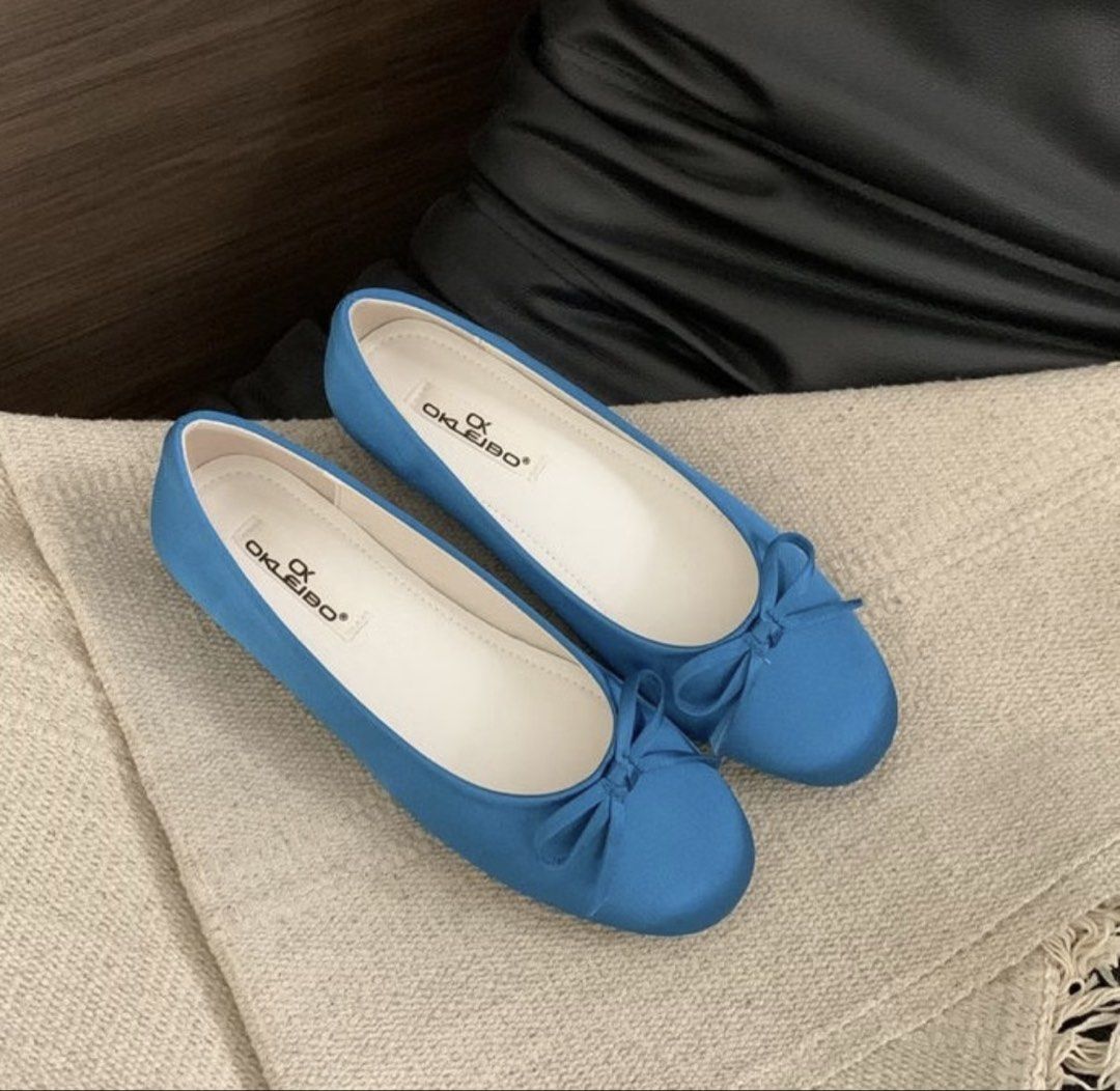 Blue Satin Ballet Flats (Category: Flats & Sandals) located in Davao. Submitted by lexshesells (Listing ID 1469962792, Image 1). Description: - Brand: Okleibo - Style: Slip-on ballet flats - Color: Bright blue - Material: Clean satin finish with white interior lining - Design: Round toe with matching bow detail - Heel: Low flat heel for all-day comfort.