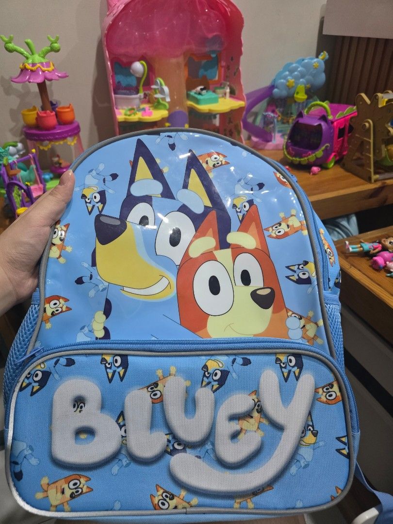 Bluey Backpack and Bluetooth Wireless Headphones Set (Category: Headphones & Headsets) located in Imus. Submitted by chie0308 (Listing ID 1470131055, Image 3). Description: - Official Bluey merchandise bundle perfect for young fans - Sparkly backpack featuring a glittery front pocket with Bluey and Bingo graphics and an all-over character print - Wireless headphones equipped with plush ear cups and cute Bluey ears on the headband - Built-in volum