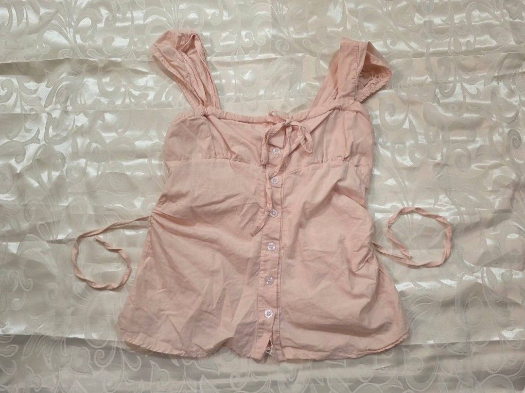 Blush Pink Tie-Front Sleeveless Top (Category: Activewear) located in Dagupan City. Submitted by drieinpink31 (Listing ID 1470050339, Image 1). Description: 🎀 DRIÉ IN PINK ITEM DETAILS • Issue/Flaw: None 📦 SHIPPING • J&T Express • Shipping fee: Shouldered by buyer 💳 PAYMENT • GCash • Maya • COD: Not available 📌 PLEASE NOTE Any issues/flaws will be stated and shown in the listing. Please check the photos and details carefully before purchasing