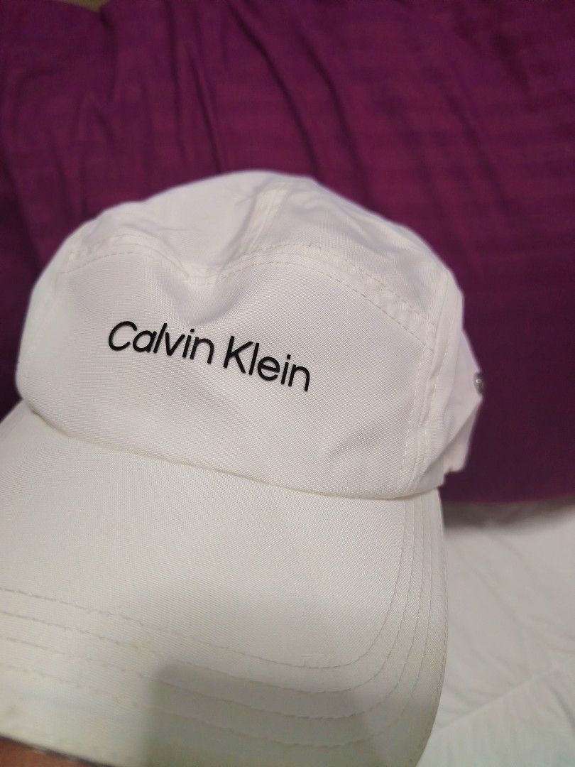 Bnew CK cap (Category: Hair Accessories) located in Quezon City. Submitted by G.E.M18 (Listing ID 1470095971, Image 1). Description: Bnew CK cap Off white color Parang may pagkaNYLON ang materials.