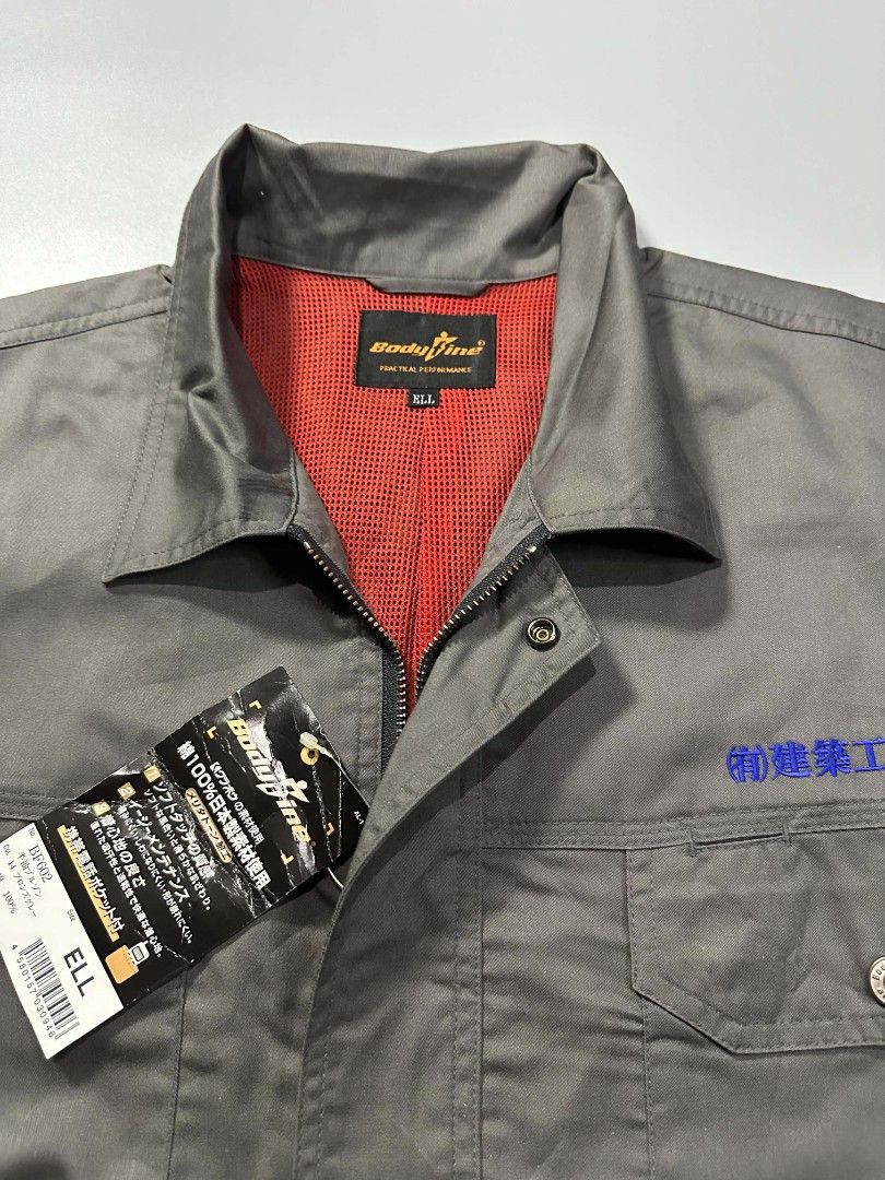 Body Fine BF602 Short Sleeve Work Jacket Grey Size ELL (Category: Coats, Jackets and Outerwear) located in Manila. Submitted by whoego (Listing ID 1470058331, Image 2). Description: - Brand: Fine (Model BF602) - Condition: Brand new with original tag attached - Size: L (ELL) Length: 27.5 inches Width: 25.2 inches Shoulders: 21.3 inches Sleeves: 10.5 inches - Color: Bronze grey - Material: 100% Japanese cotton with soft texture and easy maintenanc