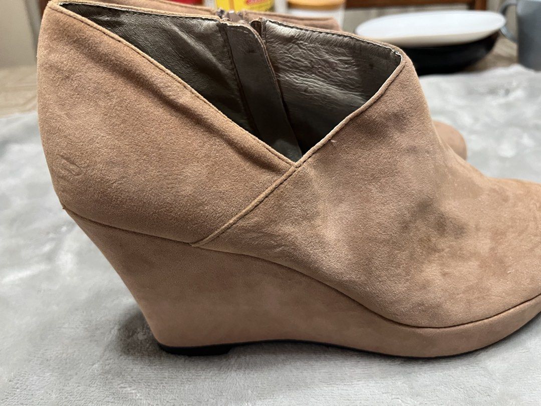 Boots (Category: Boots) located in Bacoor. Submitted by ayit. (Listing ID 1470046492, Image 3). Description: Orig personal 22cm 9 inches Size 6 sf inc - Brand: Oriental Traffic - Style: Wedge boots / booties - Color: Brown - Material: Suede - Size: EU 37 (UK 4 / US 6) - Features: Side zip closure for easy wear, comfortable wedge heel - Condition: Good pre-loved condition - Meetup location: Citta Italia Subdivision, Molino V, Bacoor, Cavite.