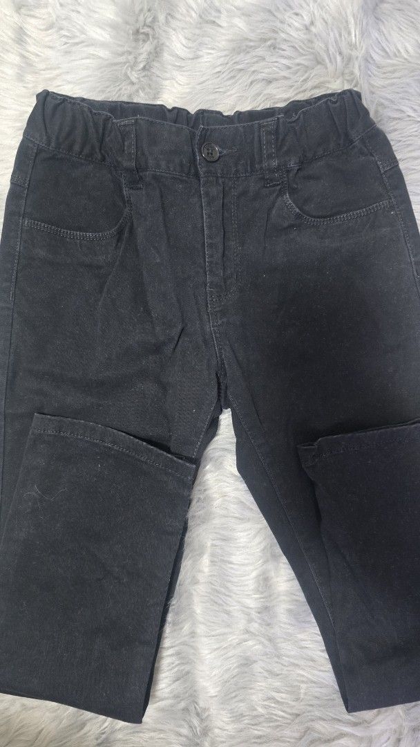 Bossini Black Pants Kids Size 120 (Category: Jeans) located in Cabanatuan. Submitted by belle_1013 (Listing ID 1470026064, Image 2). Description: - Brand: Bossini - Color: Classic Black - Size: 120 - Waist: Elastic waistband for easy dressing - Details: Front button closure and standard pockets - Condition: Clean fabric, perfect for daily wear.