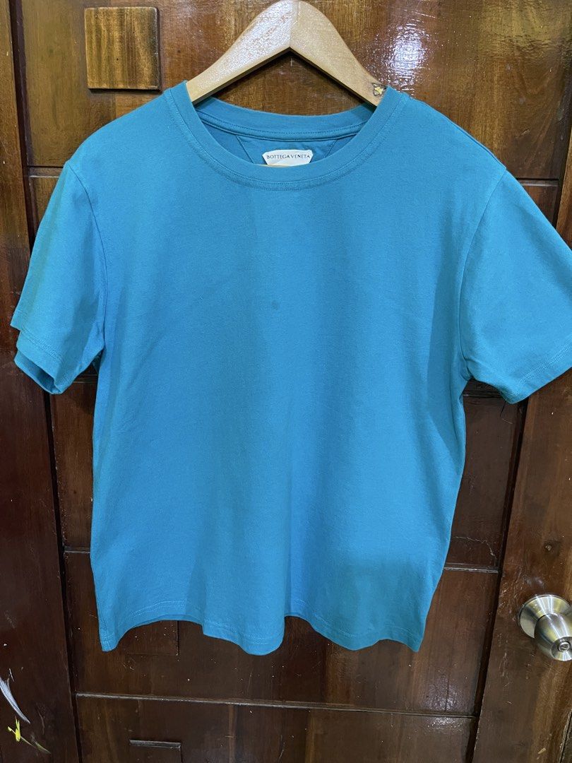 Bottega Venetta Shirt (Category: Luxury Apparel) located in Marikina City. Submitted by greatfindsmnlph (Listing ID 1470135455, Image 1). Description: Bo ttega Vene tta Shirt Price: 250 Size: Medium Width: 21.5 Length: 28 Color: Blue Green Color Rate: 10/10 Condition: 9.8/10 may dumi need wash Very nice in actual.