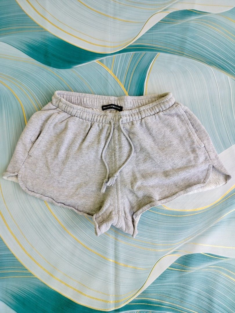 Brandy Melville Heather Grey Sweatshorts (Category: Shorts) located in Manila. Submitted by geraldquinto_917 (Listing ID 1470082106, Image 1). Description: - Brand: Brandy Melville - Color: Grey -Waist 24-34 - Style Tag: MR2112D-Z094 - Features: Elastic drawstring waistband, side pockets, trendy raw hem - Lining: Super soft fleece for ultimate comfort - Condition: Excellent / Like new - Perfect for: Chilling at home, gym sessions, or casual erran
