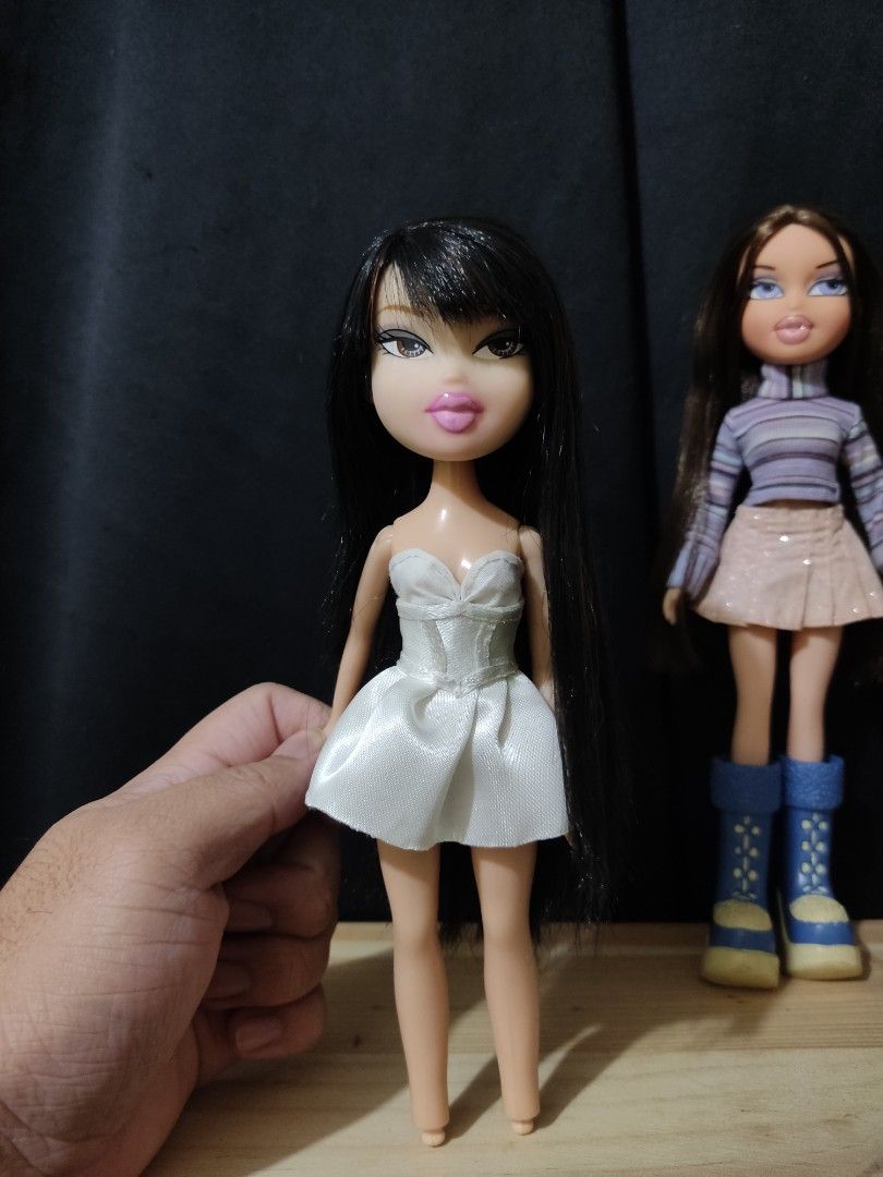 Bratz Destash Bundle (Category: Kids Toys) located in Taguig. Submitted by luckyme_luckyyou (Listing ID 1469961485, Image 3). Description: Bratz Destash Bundle ₱1,500 ALL IN Selling as bundle only. WYSIWYG: • Wintertime Dana (Rebodied) - Disclaimer: minor yellowing on outfit due to age • Ooh La La Kumi (Rebodied) - Note: has a cracked neck Freebies: • Fur jacket & extra shoes included MOP:MAYA/GCASH MOD: JNT, LALAMOVE Location: Taguig. DM if inte