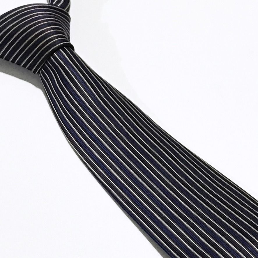 Brick House Vertical Stripes Slim Neck Tie (Category: Ties) located in Taguig. Submitted by retrogaze (Listing ID 1470001684, Image 1). Description: This slim necktie by Brick House features a deep purple and dark eggplant base woven with a crisp vertical ribbed texture. The body is styled with fine vertical pinstripes in alternating bands of royal blue, charcoal grey, and crisp white. Recommended Suit & Shirt Pairings: • The Executive Classic: D