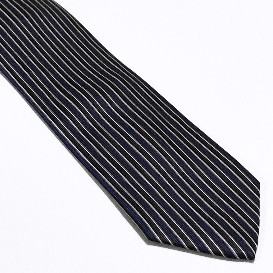 Brick House Vertical Stripes Slim Neck Tie (Category: Ties) located in Taguig. Submitted by retrogaze (Listing ID 1470001684, Image 2). Description: This slim necktie by Brick House features a deep purple and dark eggplant base woven with a crisp vertical ribbed texture. The body is styled with fine vertical pinstripes in alternating bands of royal blue, charcoal grey, and crisp white. Recommended Suit & Shirt Pairings: • The Executive Classic: D