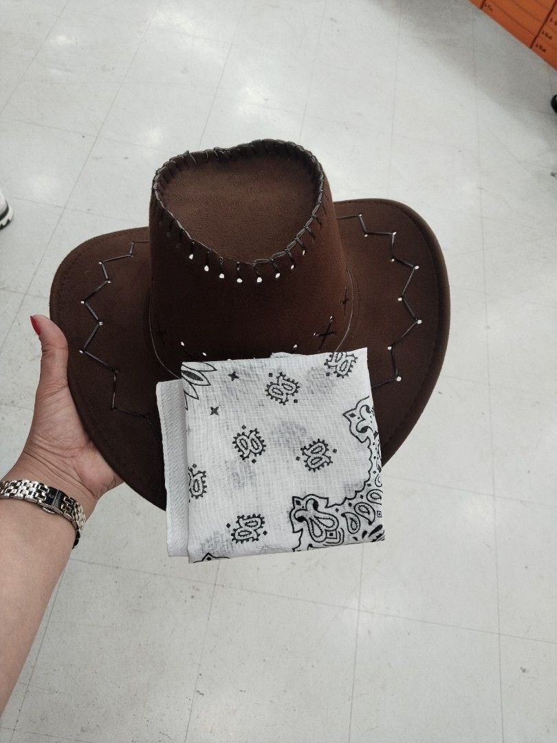 Brown Cowboy Hat with White Bandana (Category: Caps & Hats) located in Manila. Submitted by zdmal (Listing ID 1470136944, Image 2). Description: - Style: Brown faux suede cowboy hat with stylish stitched brim detailing - Bonus: Includes a folded white and black paisley pattern bandana - Condition: Worn only once, practically clean, stored properly in a smoke-free home - Perfect for: Music festivals, costume parties, or themed events - Note: Messa