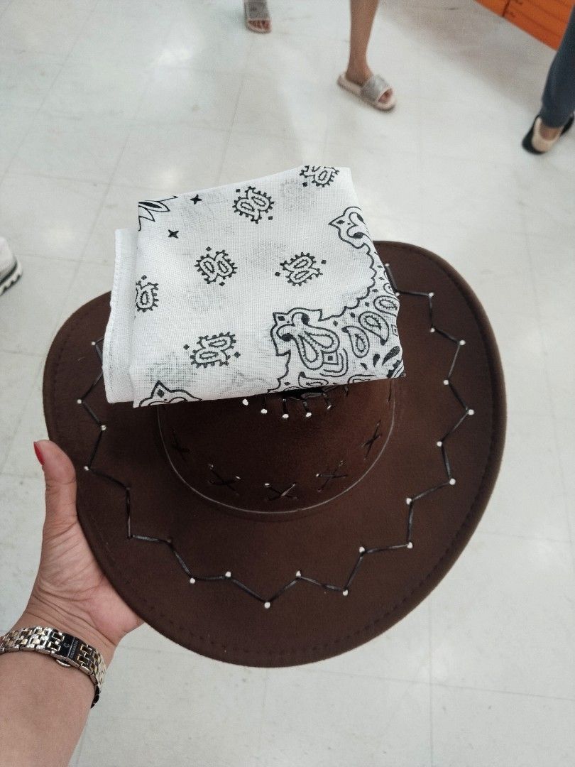 Brown Cowboy Hat with White Bandana (Category: Caps & Hats) located in Manila. Submitted by zdmal (Listing ID 1470136944, Image 1). Description: - Style: Brown faux suede cowboy hat with stylish stitched brim detailing - Bonus: Includes a folded white and black paisley pattern bandana - Condition: Worn only once, practically clean, stored properly in a smoke-free home - Perfect for: Music festivals, costume parties, or themed events - Note: Messa