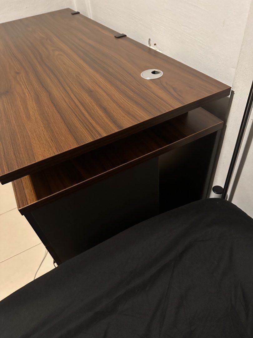 Brown study table (Category: Tables & Sets) located in Singapore. Submitted by luckyfounder (Listing ID 1469961427, Image 2). Description: Size: 140cm Need your own delivery service Unable to dismantle need about 2 ppl to carry out .