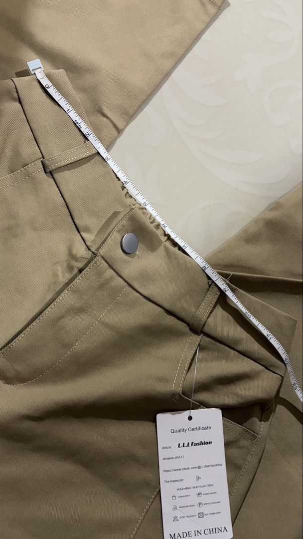 brown trousers (Category: Jeans) located in Baguio. Submitted by iyychen (Listing ID 1470055533, Image 2). Description: 24 waist can stretch up to 30 with garter back .