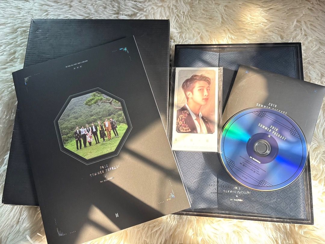 BTS 2019 Summer Package in Korea (Category: K-Wave Merchandise) located in Manila. Submitted by ladyoflight (Listing ID 1470101184, Image 1). Description: - Official BTS 2019 Summer Package (Black edition) - Includes outer box and photobook - Comes with RM photocard - Includes DVD disc - Perfect addition to your ARMY collection - What you see is what you get.