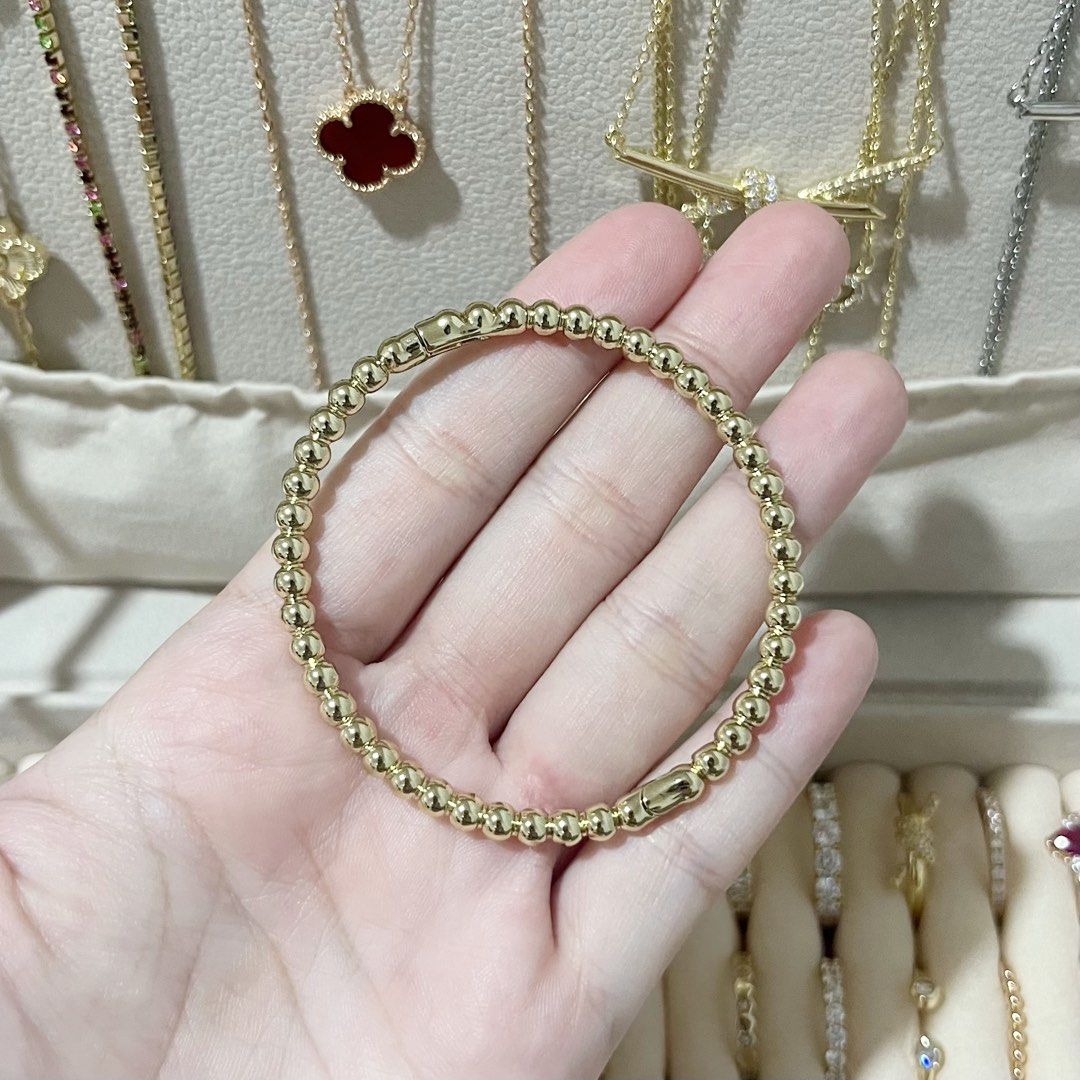 BUBBLE GOLD BANGLE (Category: Bracelets) located in Talavera. Submitted by curatedbykhy (Listing ID 1470076678, Image 2). Description: gandaaa! perfect for stacking can fit petite girlies! small (15-16 cm) light gold color (not yellowish!).