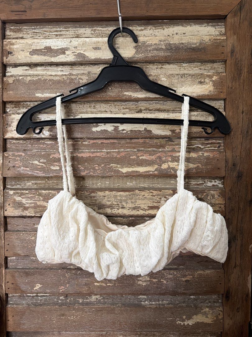 Bubble short and bralette set (Category: Sets or Coordinates) located in Manila. Submitted by cb_____ (Listing ID 1469969318, Image 2). Description: - Style: Cute cottagecore two-piece set - Design: Strappy crop top base with an off-shoulder ruffled overlay - Material: White textured fabric with a subtle all-over pattern - Fit: Snug and secure with an elasticated top edge - Pairing: Great with denim shorts or midi skirts for sunny days.