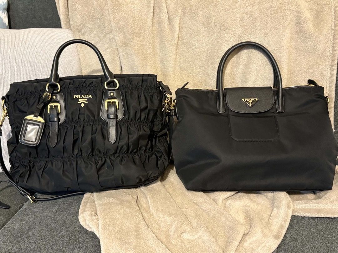 BUNDLE Prada Black Nylon Handbags (Category: Luxury Bags & Wallets) located in Makati City. Submitted by mariaasevilla0622eb (Listing ID 1469967853, Image 1). Description: - Authentic black Prada nylon handbags (Choice of 2 distinct styles) - Left Bag: Features elegant gathered ruching, luxury gold hardware, dual buckled straps, and a hanging clochette - Right Bag: Features classic dual top handles, a functional front flap pocket, and the iconic 