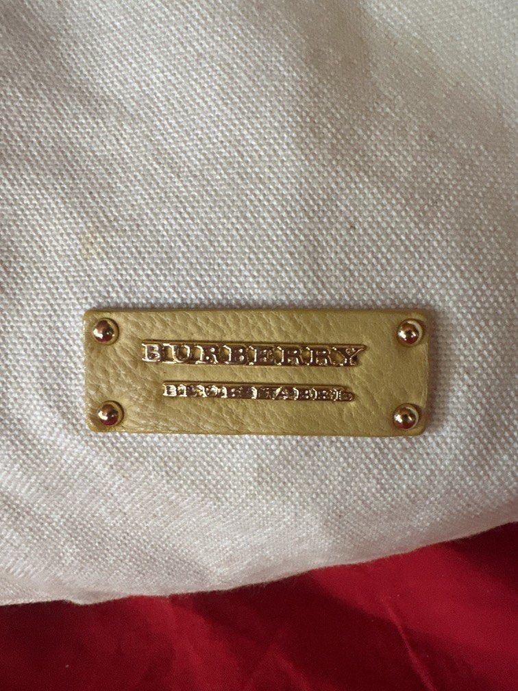 Burberry Blue Label (Category: Tote Bags) located in Caloocan City. Submitted by hariel_beverly_onlineshop (Listing ID 1470018850, Image 3). Description: Burberry Blue Label Canvas Stowell Tote Bag with yellow leather trim. Burberry Blue Label was an exclusive, licensed sub-brand produced for the Japanese market, renowned for its casual aesthetic, durable canvas material constructions, and minimalist plate branding..