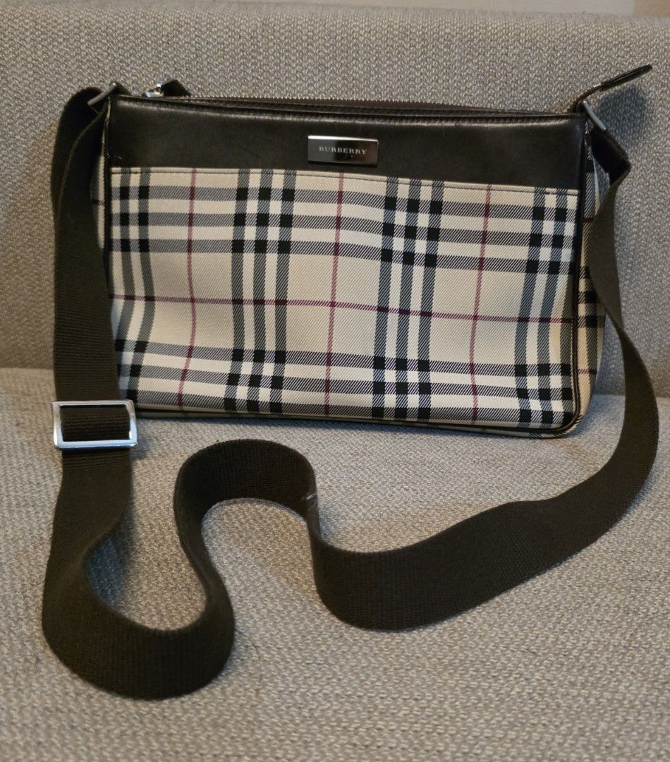 Burberry Check Crossbody Bag (Category: Luxury Bags & Wallets) located in Pasig City. Submitted by starfjames (Listing ID 1469980458, Image 1). Description: Pre-loved authentic Burberry crossbody bag for only P12K! Grab this rare great deal now! Nice, good condition. Exterior large slip pocket, zip main compartment, 1 interior zip pocket, 1 interior slip pocket, lined interior with Burberry markings. Approx. dimensions: 11 x 7 x 2 inches. .