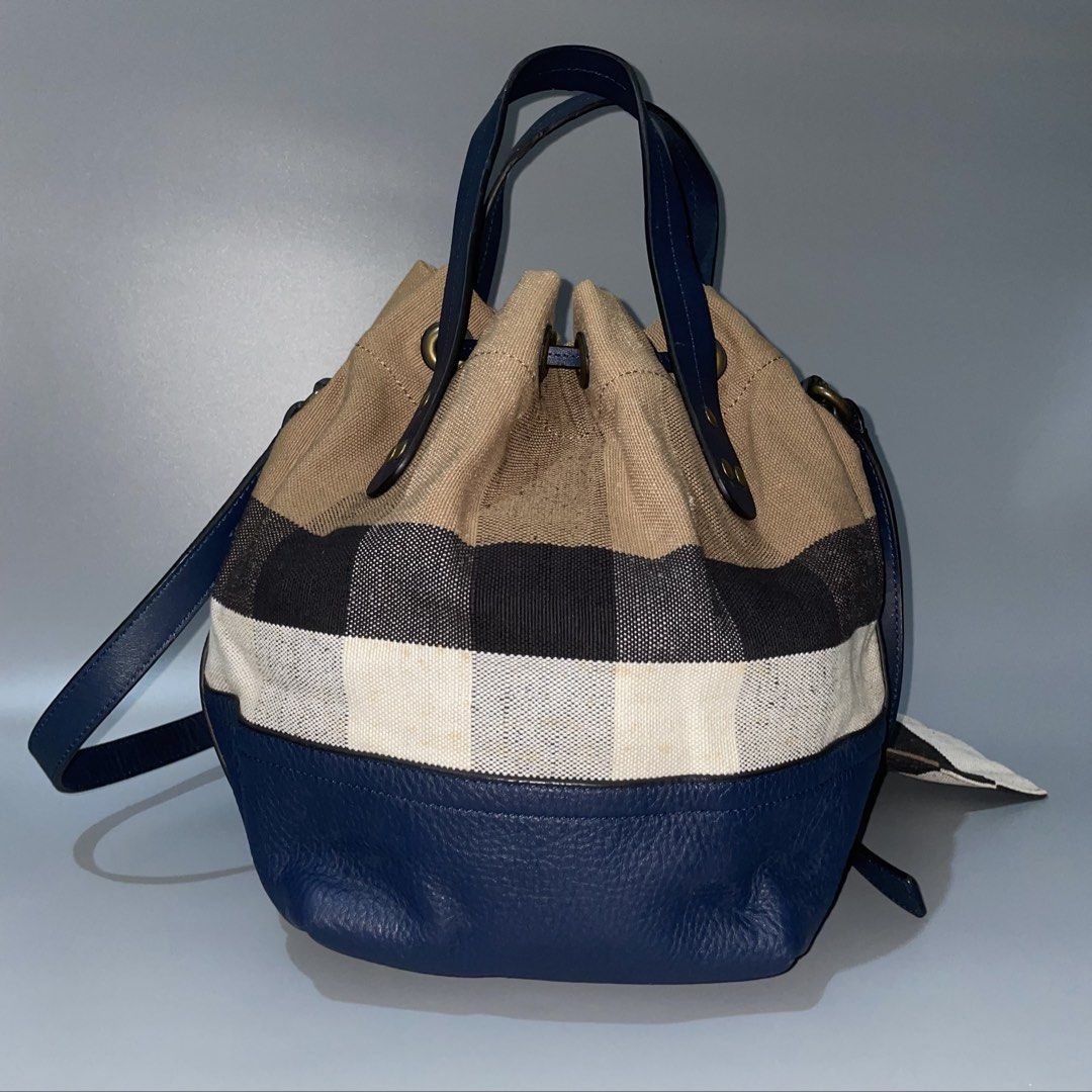 Burberry Heston Bucket Bag (Category: Luxury Bags & Wallets) located in Manila. Submitted by astral_ (Listing ID 1470074145, Image 2). Description: Burberry Heston Bucket Bag Size: Medium Condition: Lightly used Issue: minor signs of wear Dimes Width: 10 in Height: 11 in Depth: 7 in Price: 6,500 shipped.