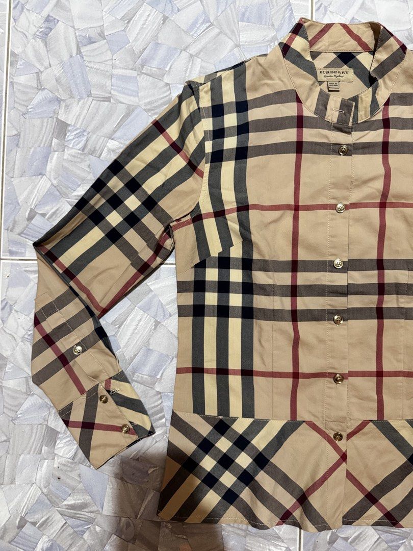BURBERRY PLAID LS WOMENS (Category: Longsleeves) located in Argao. Submitted by janmaning-0624l95 (Listing ID 1470013649, Image 2). Description: BURBERRY PLAID LS SIZE SMALL WOMENS DIMES 17 x 24 Good as new 1,500 Location Argao Cebu .