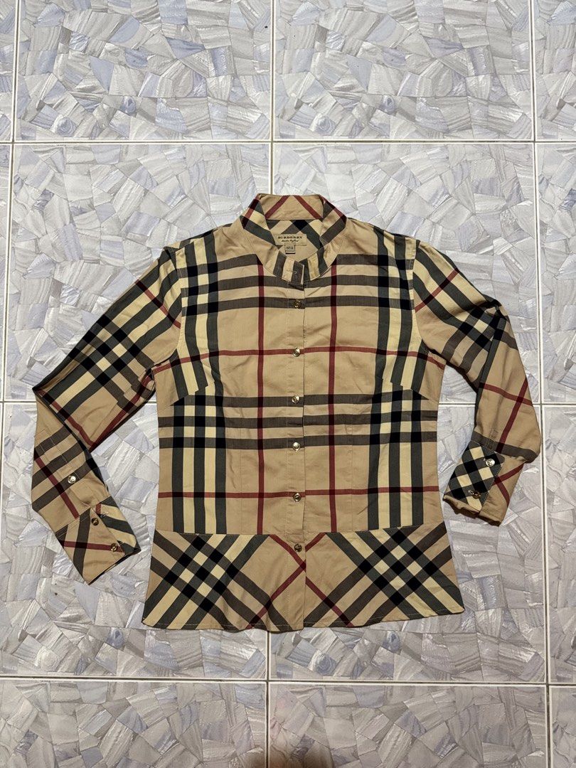 BURBERRY PLAID LS WOMENS (Category: Longsleeves) located in Argao. Submitted by janmaning-0624l95 (Listing ID 1470013649, Image 1). Description: BURBERRY PLAID LS SIZE SMALL WOMENS DIMES 17 x 24 Good as new 1,500 Location Argao Cebu .