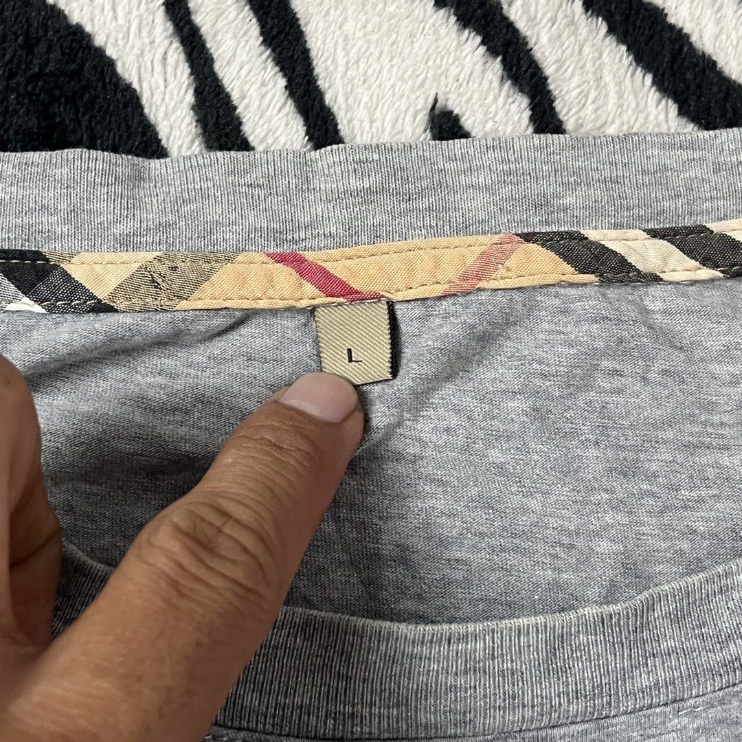 Burberry side logo tshirt (Category: Shirts) located in Manila. Submitted by royaldripmanila (Listing ID 1470049131, Image 3). Description: No issue W20 L26.5.